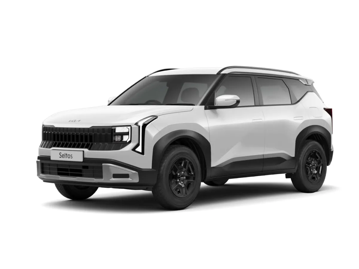 Front three-quarter view of a white Kia Seltos HTE variant against a white background, showcasing the entry-level trim features.